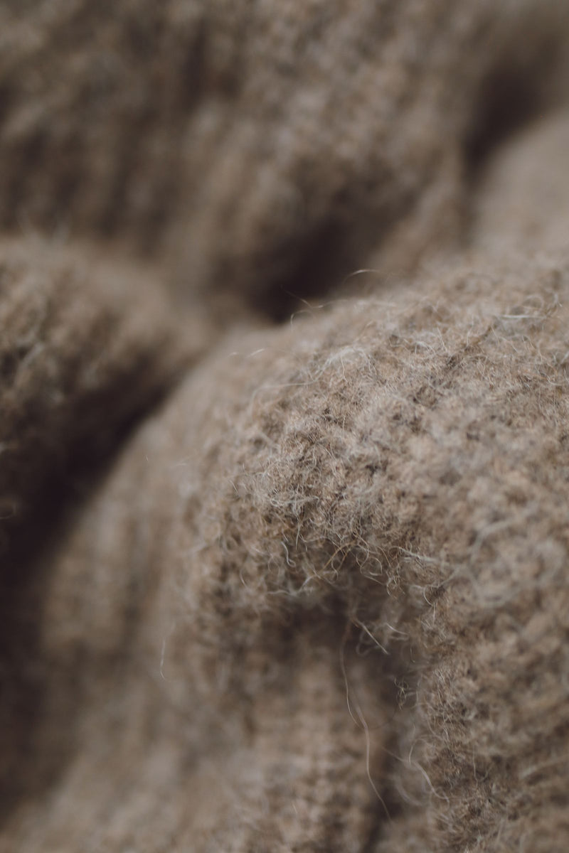 Undyed brown wool, close-up